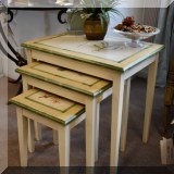 F02. Set of 3 hand painted nesting tables 24”h x 24”w x 18”d 